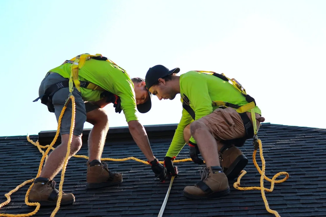 Wingate roofer working on a metal roof