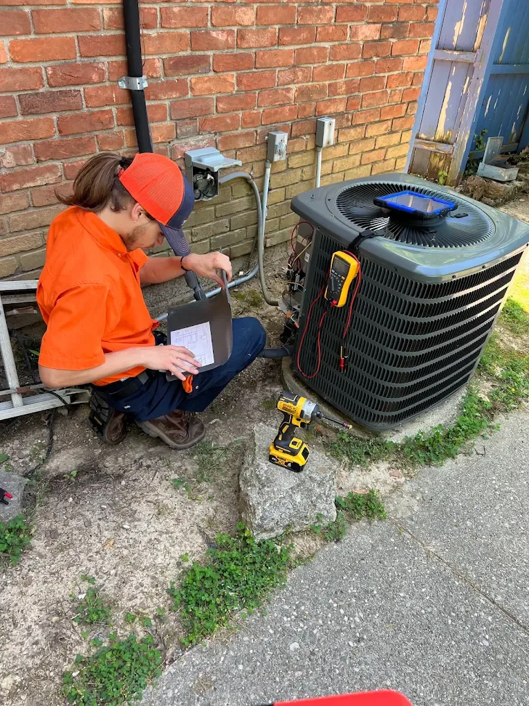 Outdoor AC condenser unit serviced by Wingate